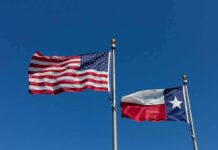 Blue Texas? Control Odds Explode American and Texas flags waving on flagpoles
