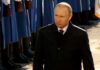 Spy Poisoning Revisited: Russia Now ‘Pressing Threat’ Vladimir Putin walking past a guard of honor