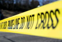 Horror Mercedes Plows Bronx Crosswalk Yellow police tape stretched across an outdoor scene