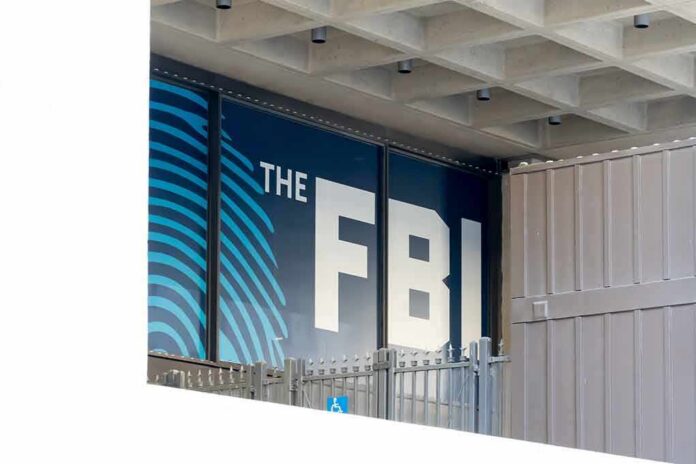 shutterstock_1635792406 FBI sign on building facade behind metal fence