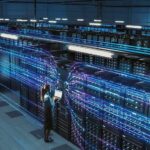 Rate Hike Panic Spurs Wild Trump Mandate Technician with laptop in a large data center aisle