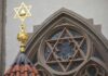 $7M Shields Synagogues, Standards Missing Star of David atop synagogue roof with stained glass window
